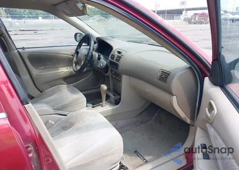 1999 Toyota Corolla Ce из США, поврежденный, VIN 2T1BR12E1XC244432